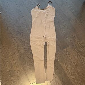 TNA Action butter jumpsuit taupe size small